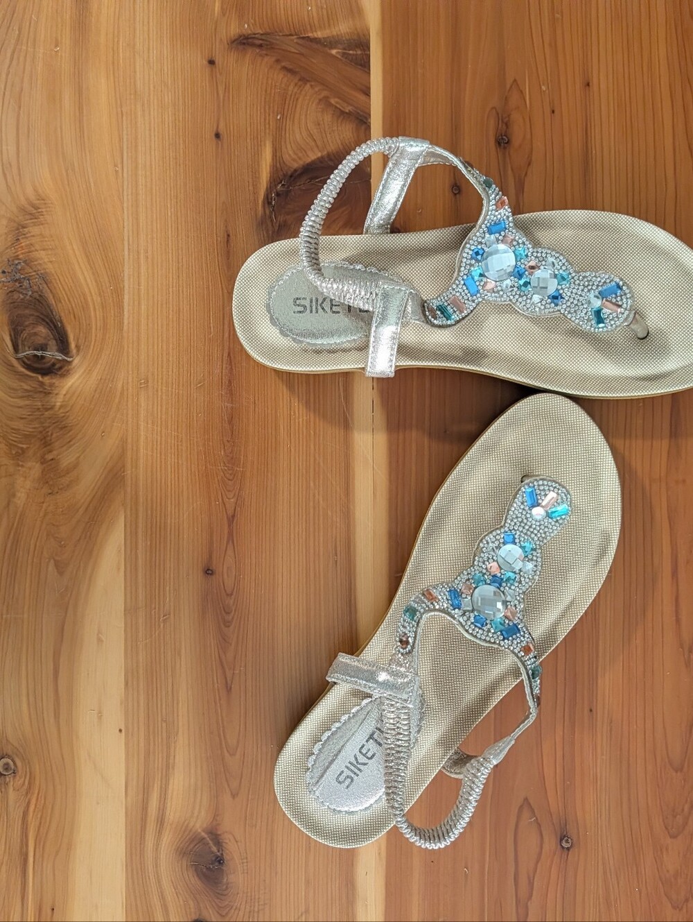 Metallic Gold T-Strap Sandals with Blue and Pink Gem Accents - Picture 2 of 4